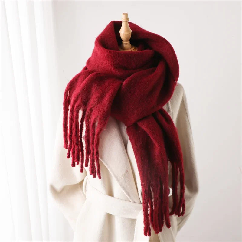 Tassel ends on the women's cashmere feel blanket scarf