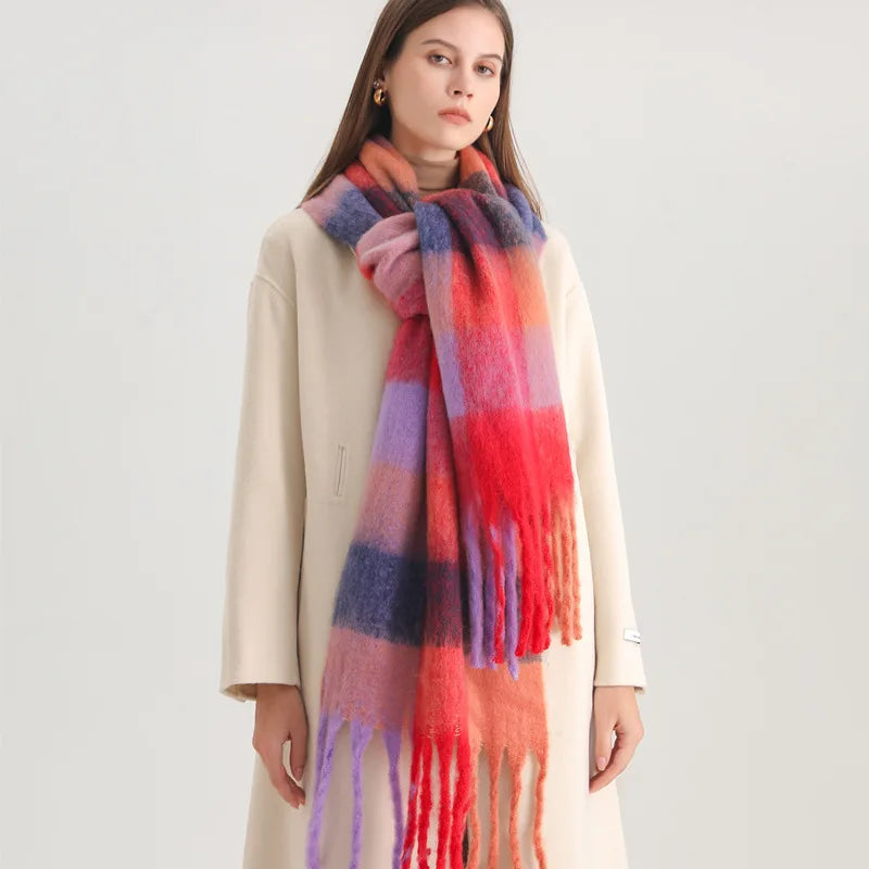 Tassel ends on the long plaid blanket scarf