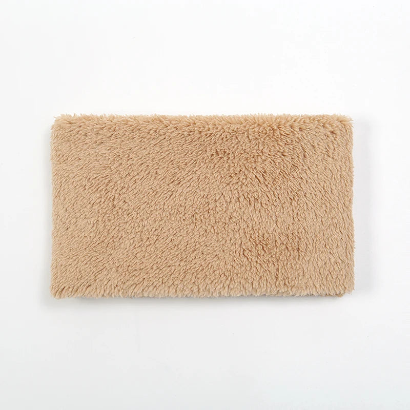 Closed loop plush neck warmer that pulls over the head