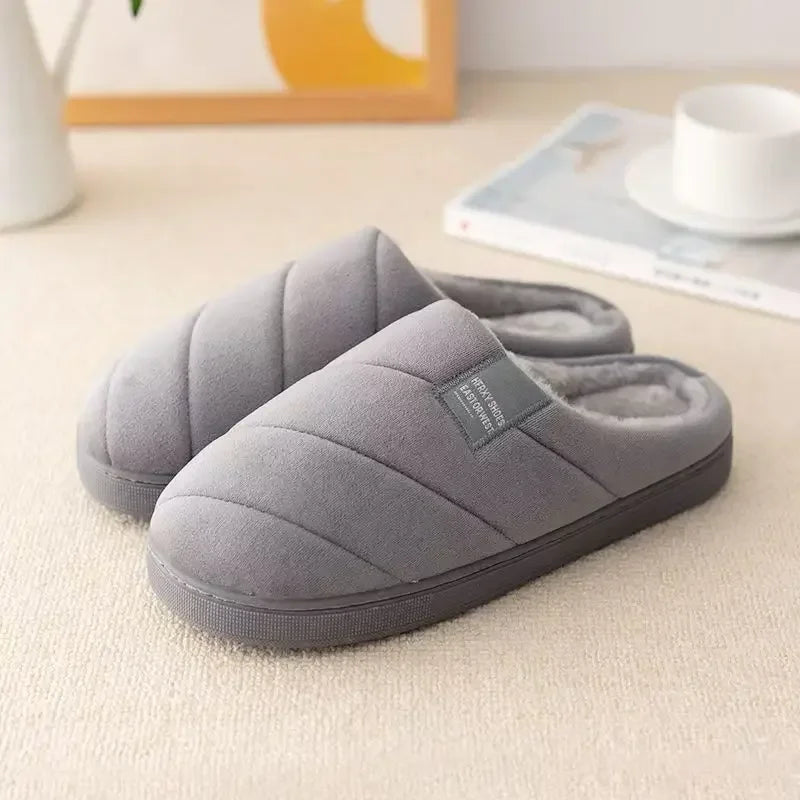 Thick non slip TPR sole on the wide fit plush indoor slippers