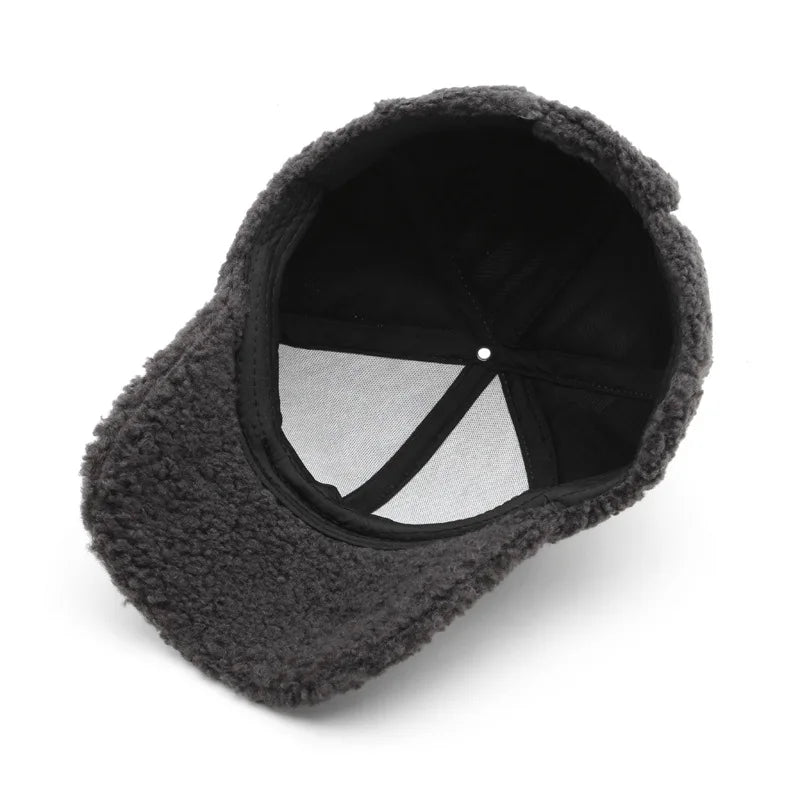 Curved brim on the women's faux lamb wool cap