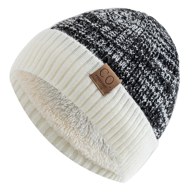 Folded cuff on the unisex two tone fur lined beanie