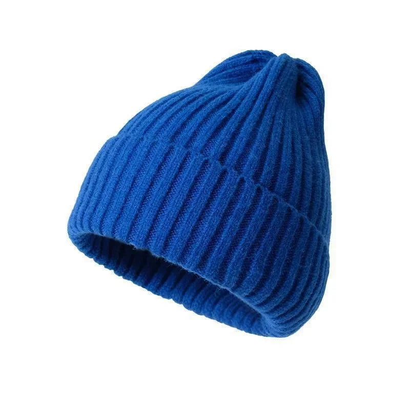 Close fitting crochet beanie that sits under a hood