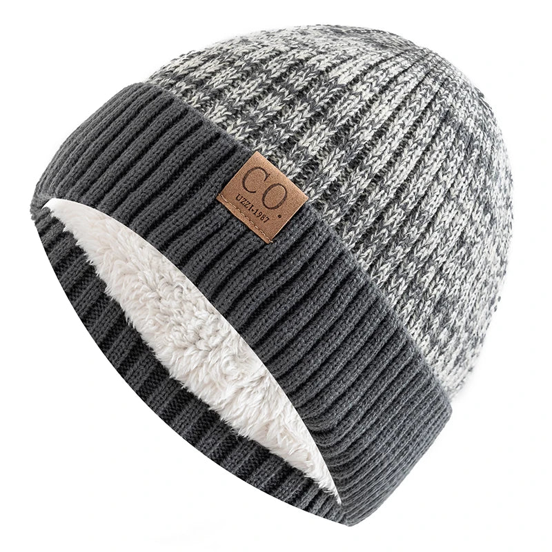 Unisex two tone knit beanie with a faux fur lining