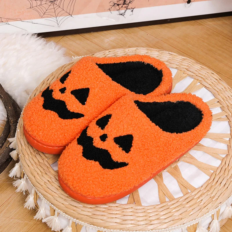 Women's plush pumpkin house slippers with an applique pumpkin