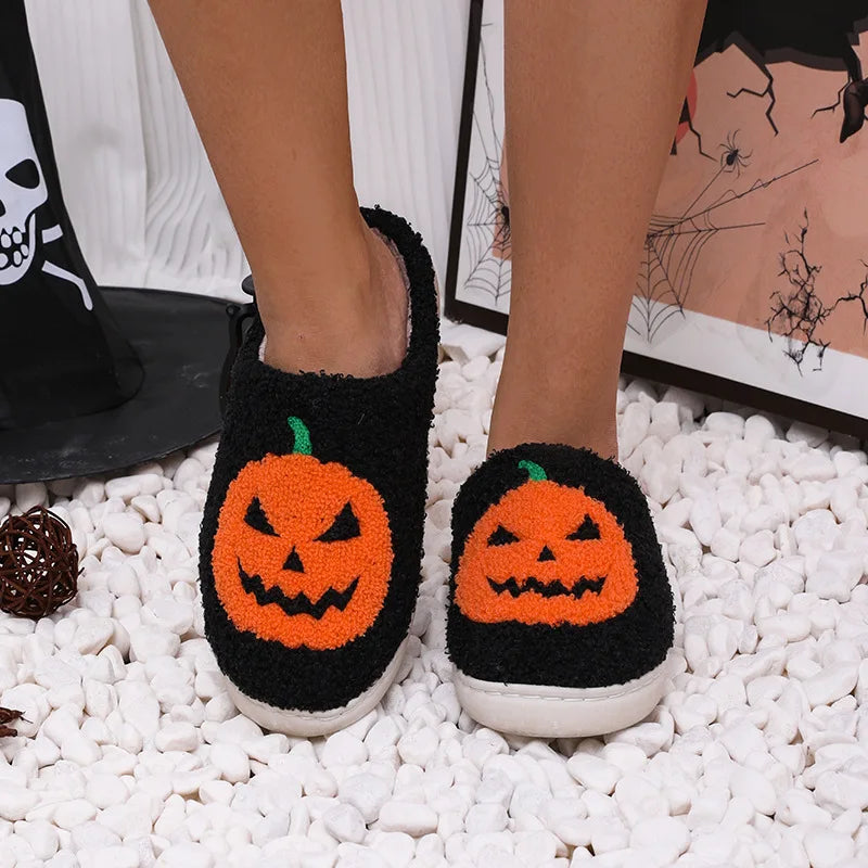 Applique pumpkin detail on the women's plush house slippers