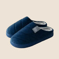 Wide fit unisex plush indoor slippers with a thick non slip sole