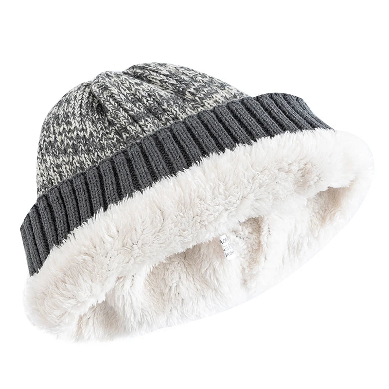 Faux fur lining inside the two tone knit beanie