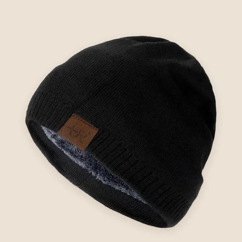 Unisex fleece lined knit beanie on a warm neutral background