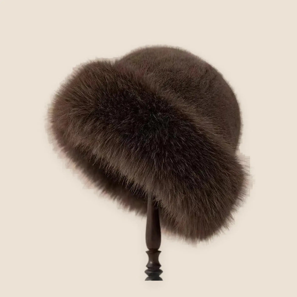Women's faux fur brimless winter hat on a warm neutral background