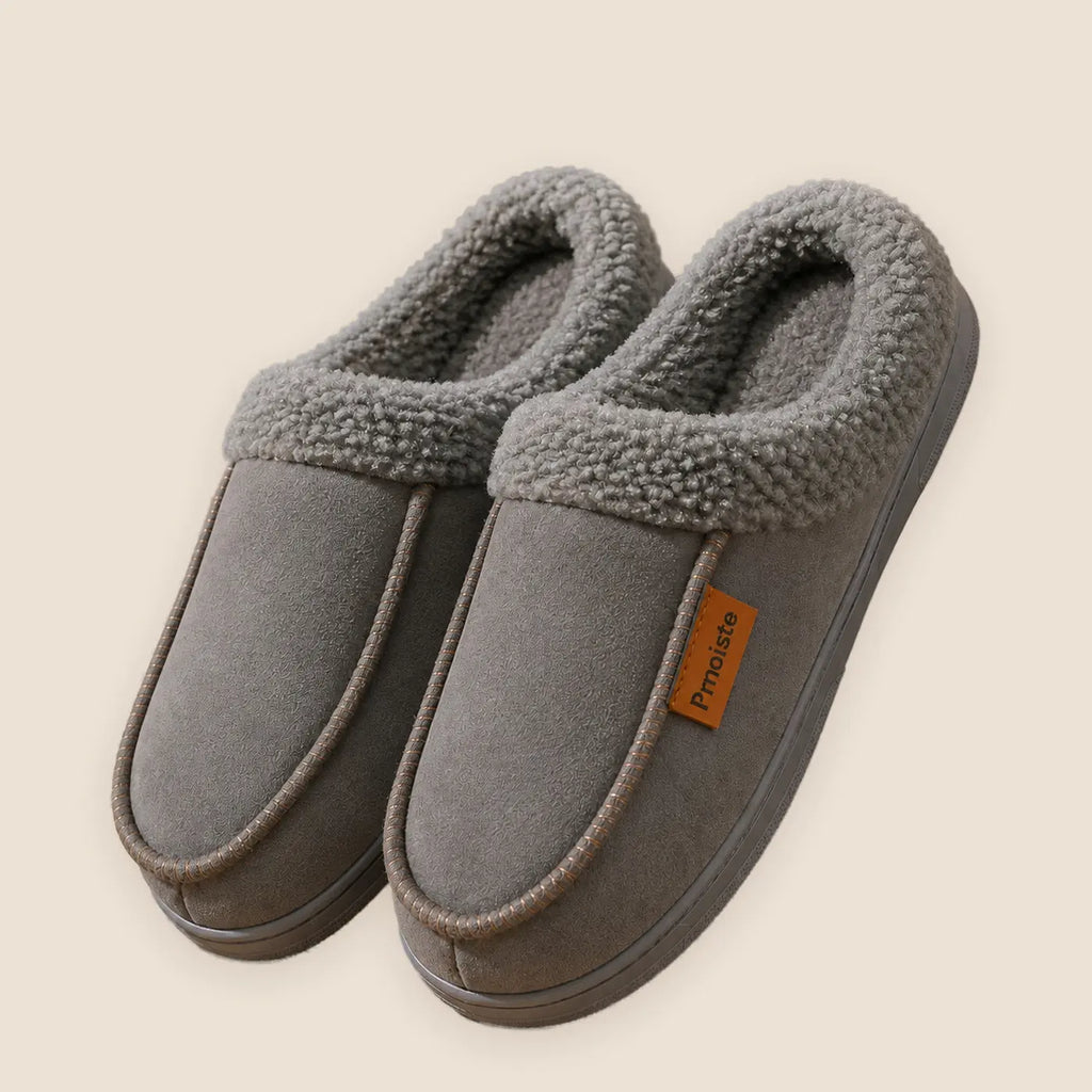 Men's suede house slippers with TPR sole on a warm neutral background